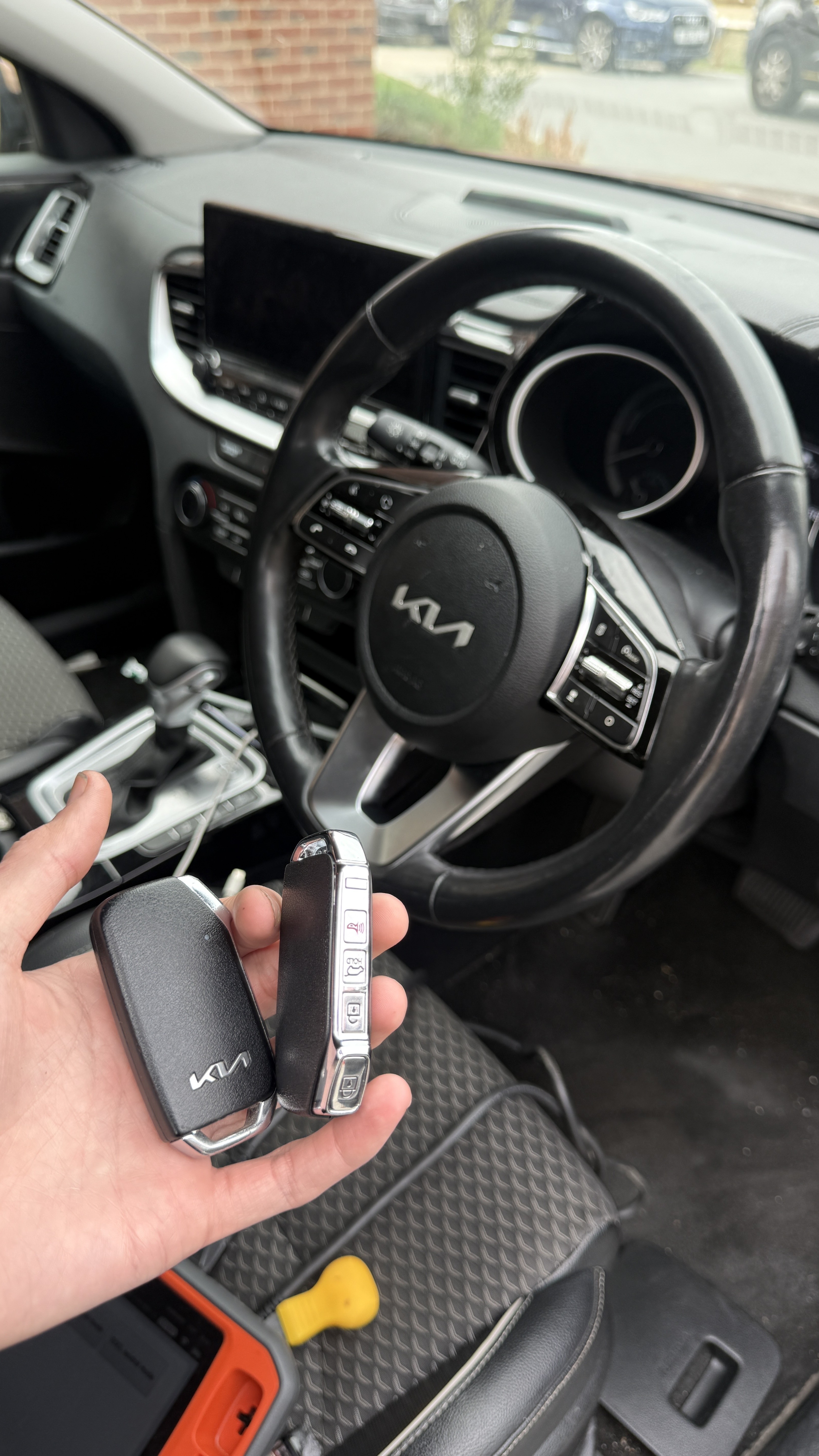 Kia smart key fobs programmed on-site by KeyLogik mobile auto locksmith