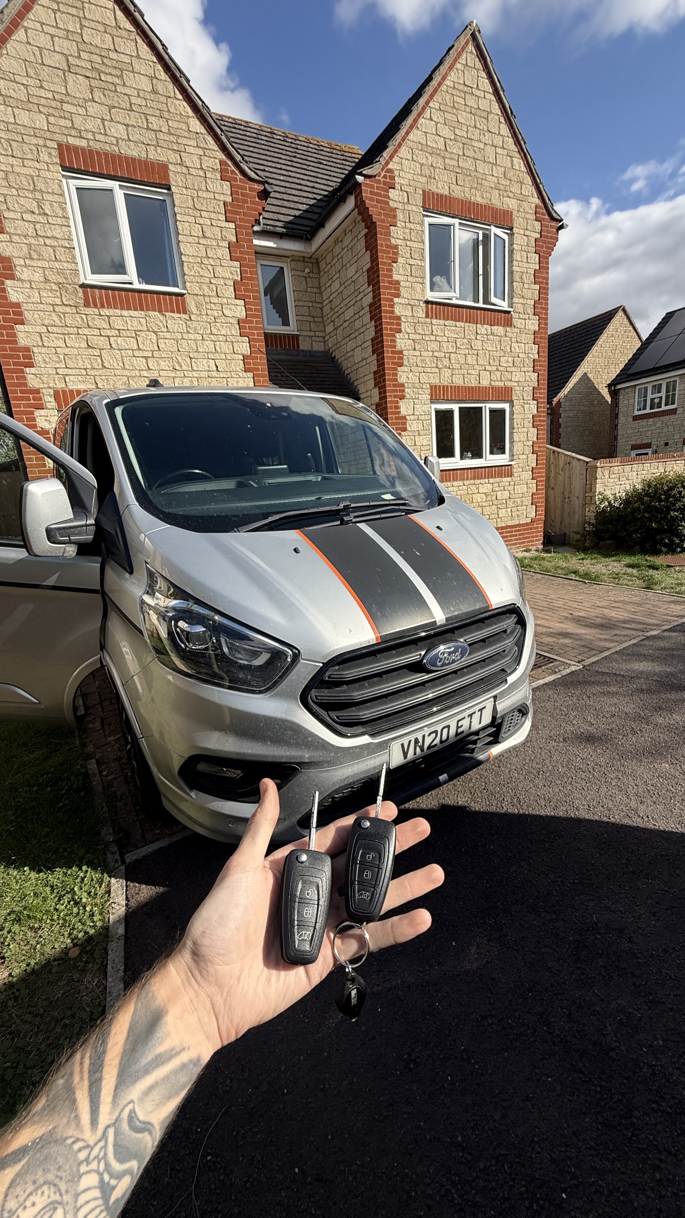 Two Ford flip keys supplied and programmed for a Ford Transit van by KeyLogik mobile auto locksmith