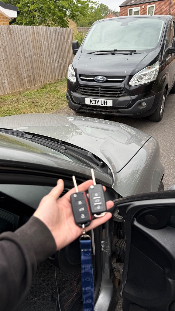Old and new VW Passat keys compared at the customer's home in Oxford