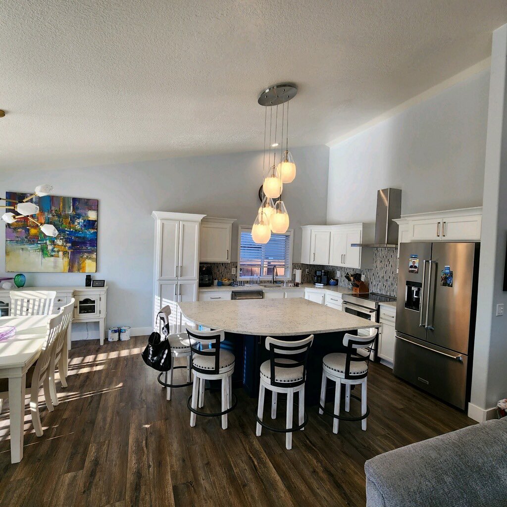 Kitchen with Wood Island & Pendant Lights
