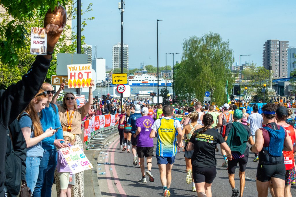 Your ex is behind you run sign at the marathon
