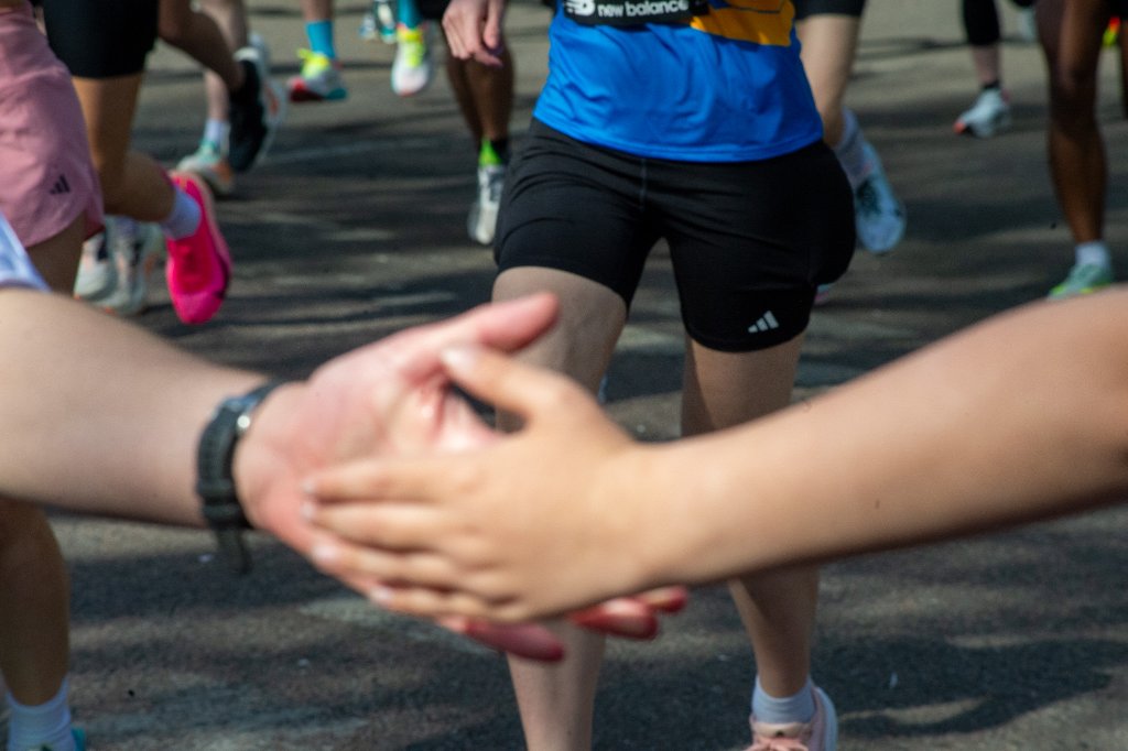 Runners heading toward Woolwich past a terrace