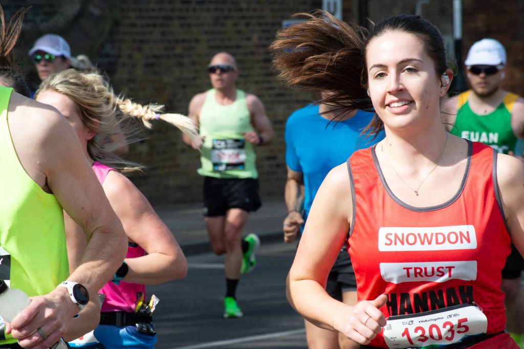 Runner in red and yellow KSS shirt