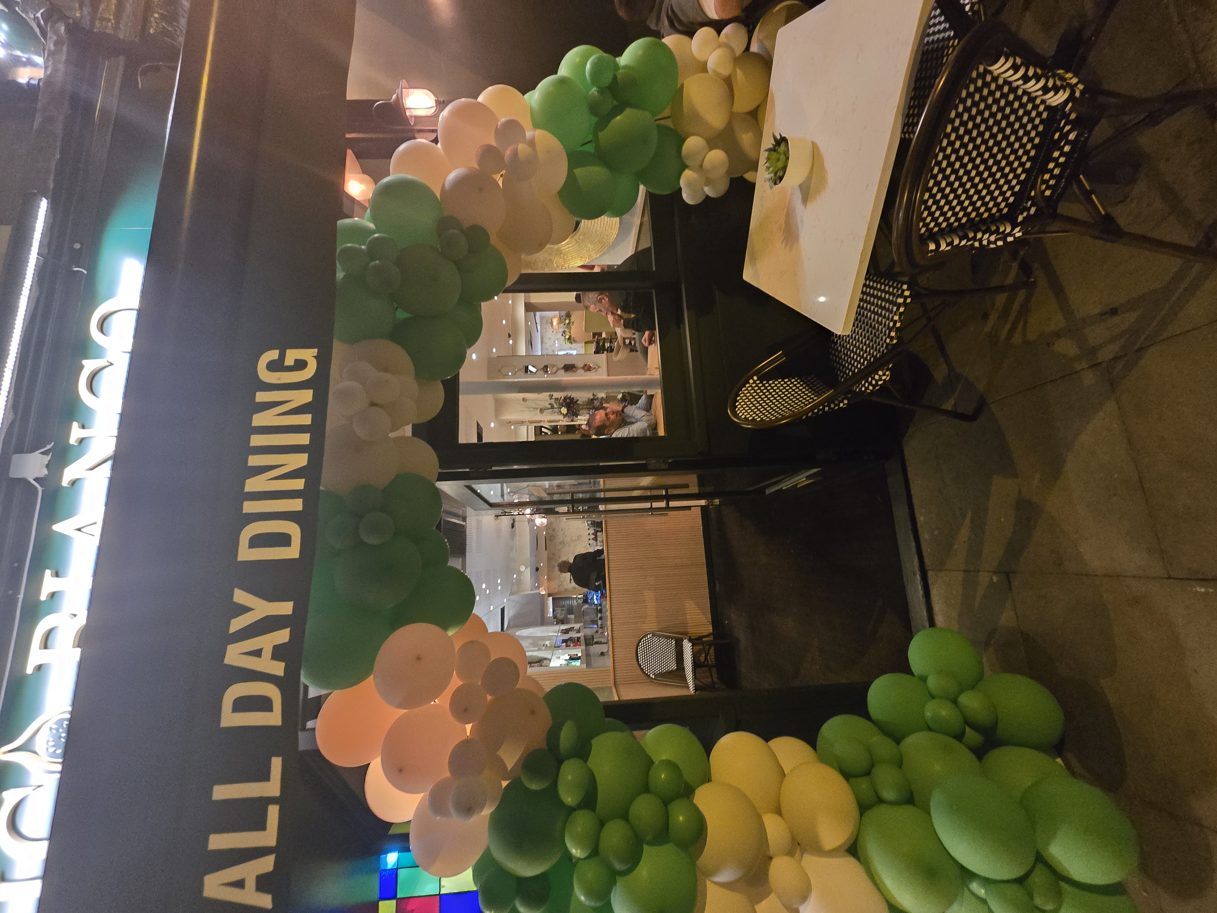 Fico Bianco entrance at night with balloon arch