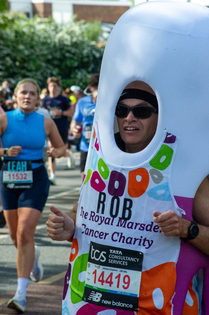 Runners hugging on the course