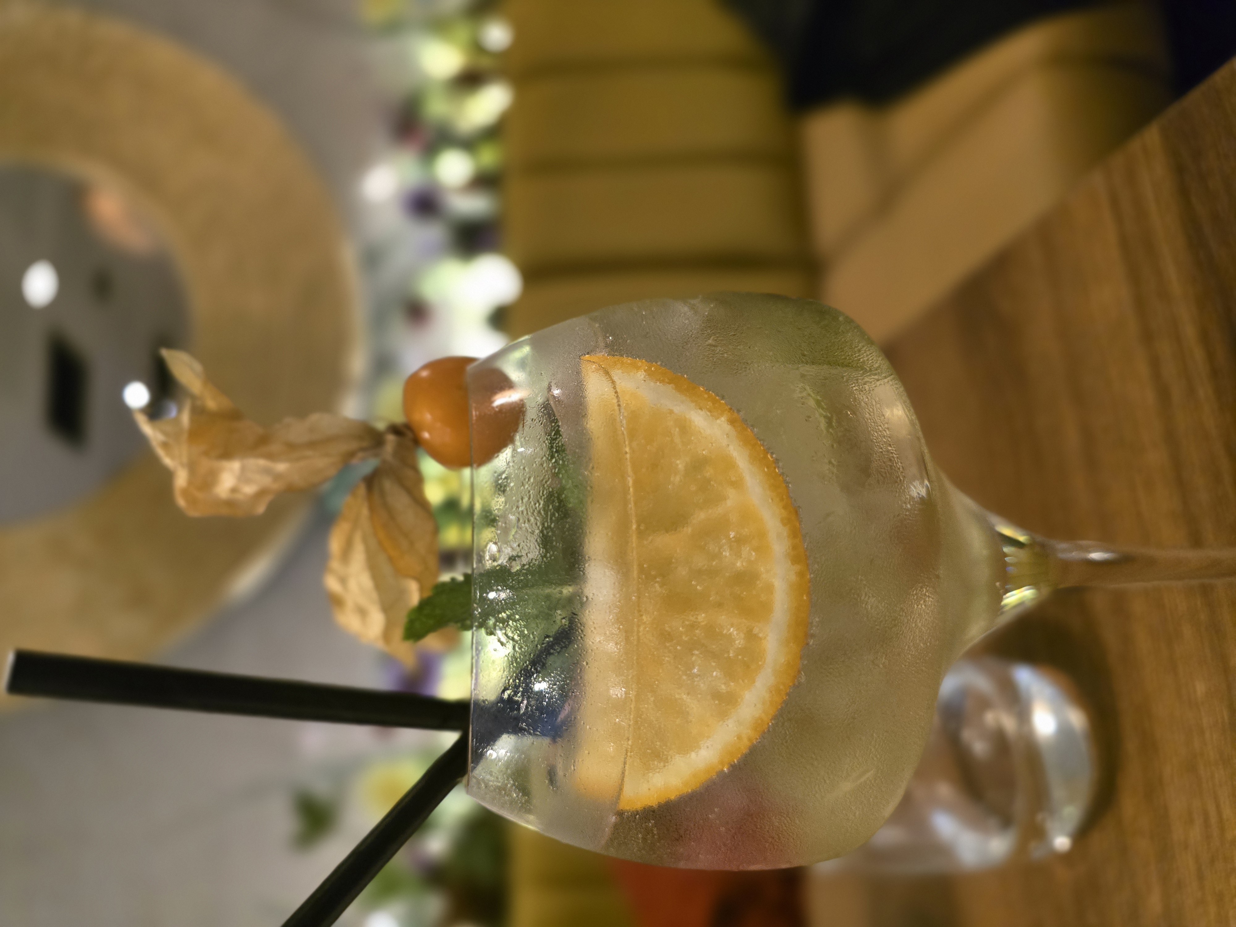 Cocktail close-up with physalis garnish