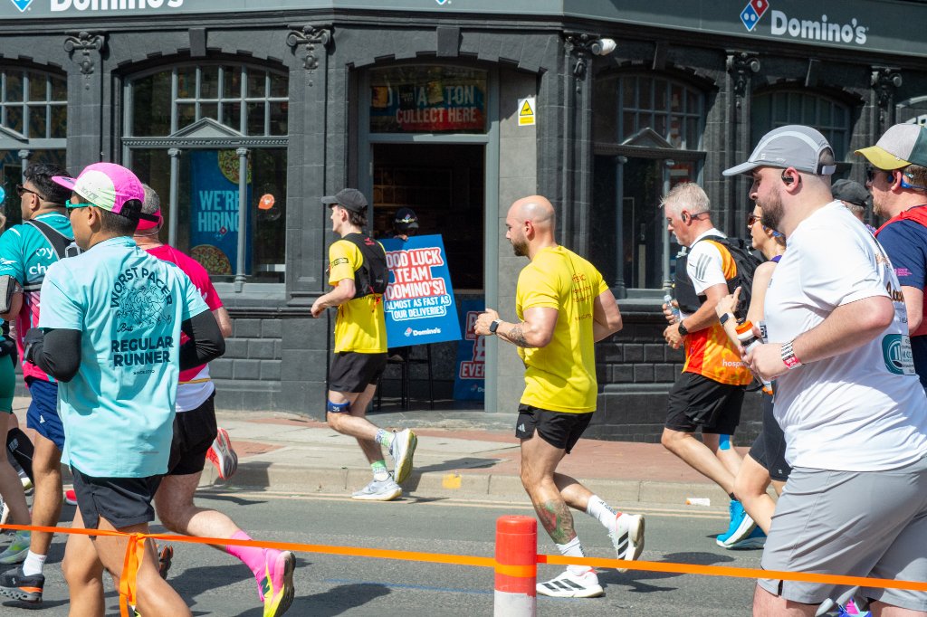 Runners streaming through south London toward London skyline