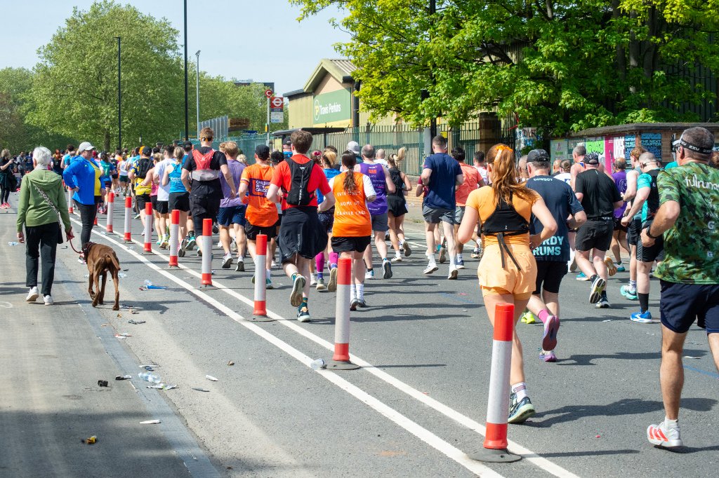 Runners past East Greenwich Fire Station