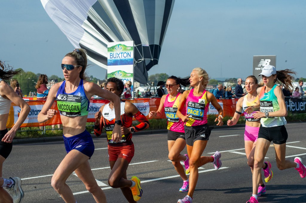 Runner in Teenage Cancer Trust vest