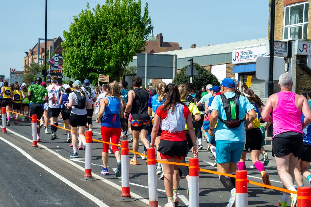 Runners past children in fairy costumes