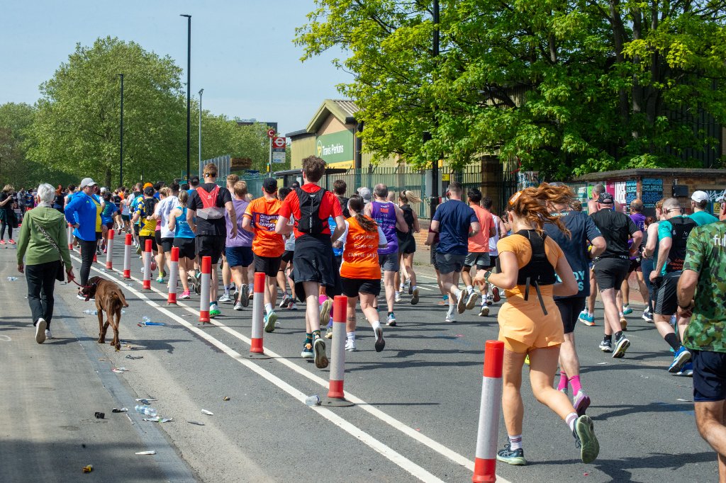 Runner in pink Children with Cancer vest