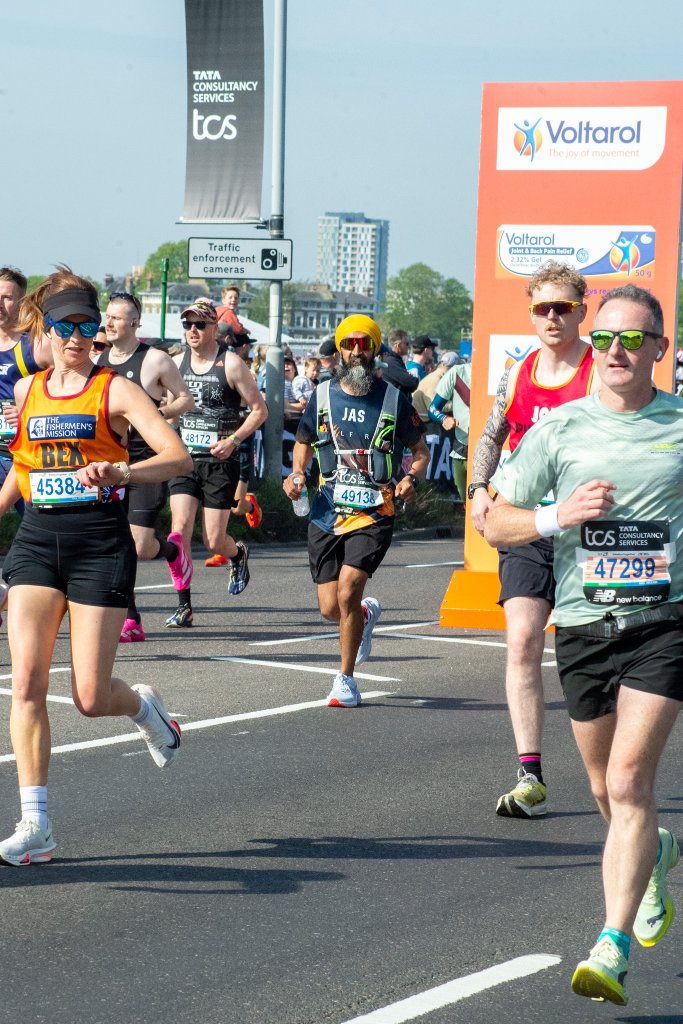 June runner close up portrait mid-race