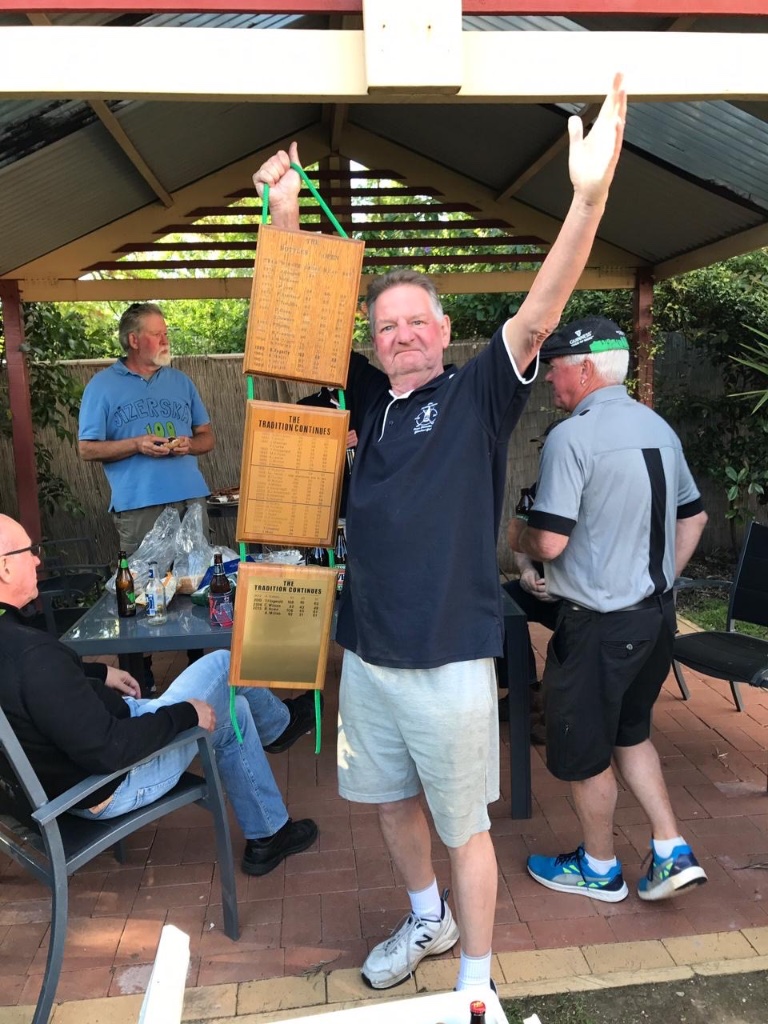 Man with the Trophy Board