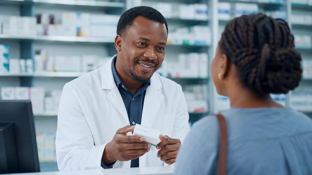 Pharmacist assisting a patient