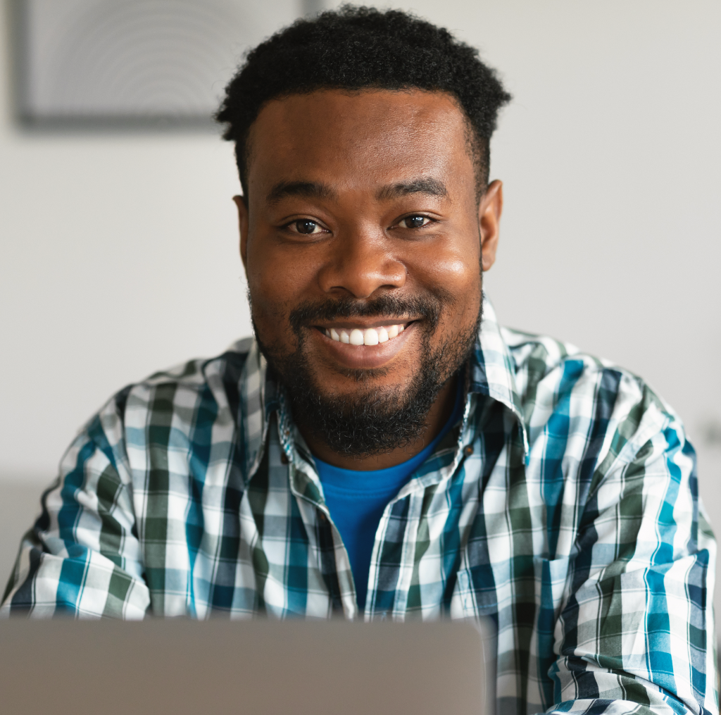 African employee at work, supported via Kernel EOR/COR