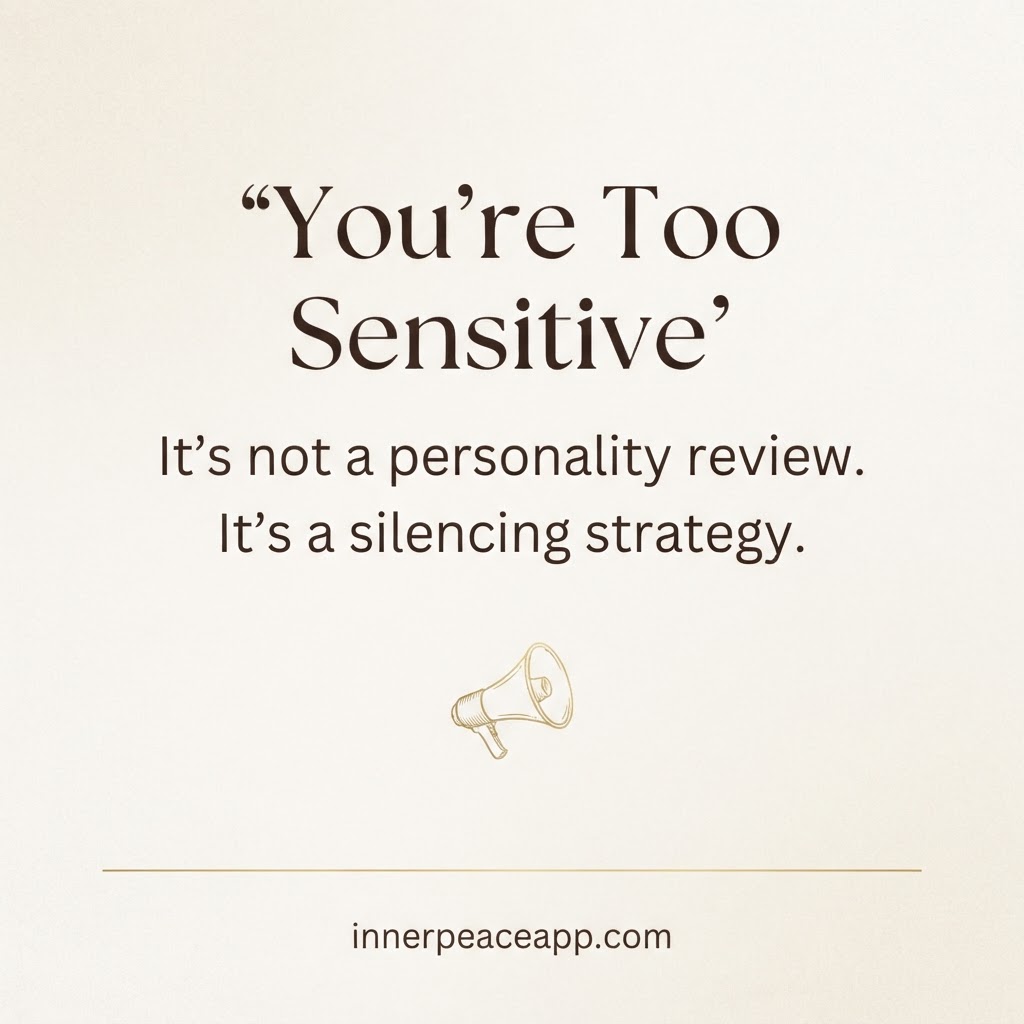 Pinterest pin, cream background with gold megaphone illustration, quote: you're too sensitive, explained as a silencing strategy.