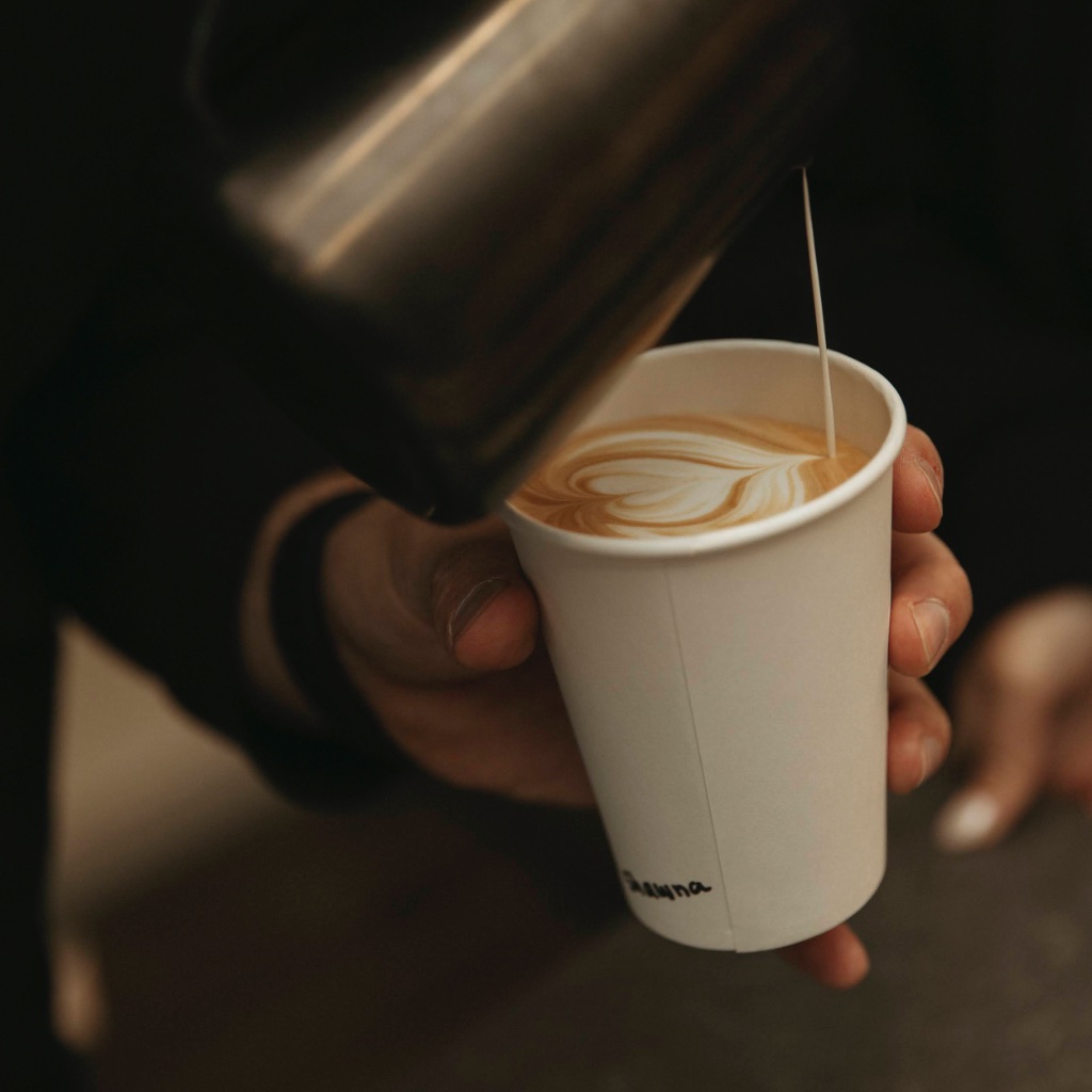 Ezpresso barista crafting a specialty espresso drink at a mobile coffee bar in Arizona