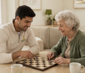 Caregiver and client playing checkers