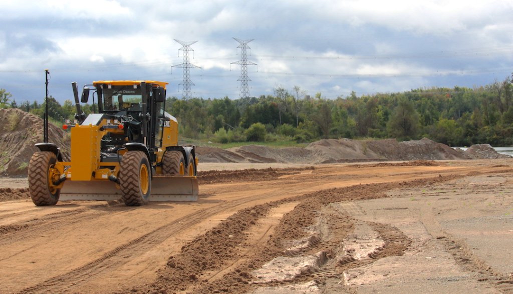 John Deere motor grader on site