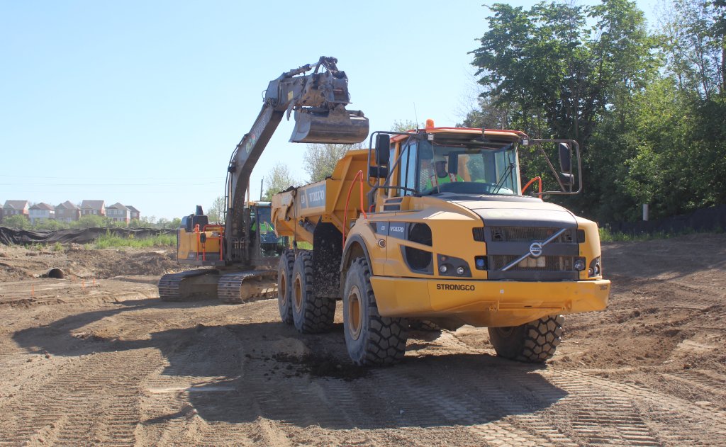 Volvo articulated dump truck and excavator