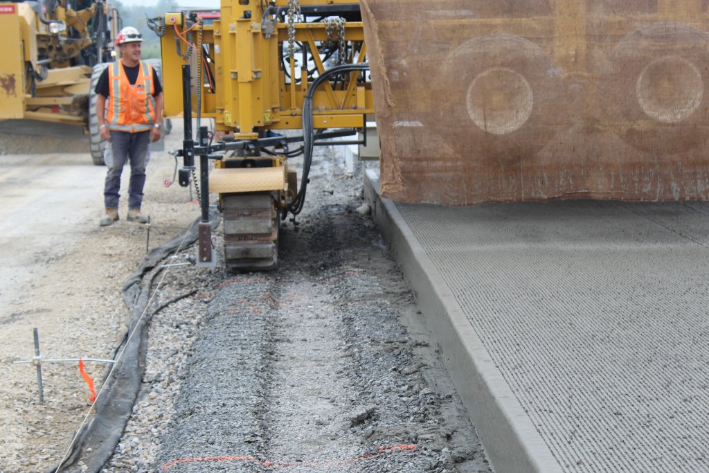 Concrete paving machine in operation