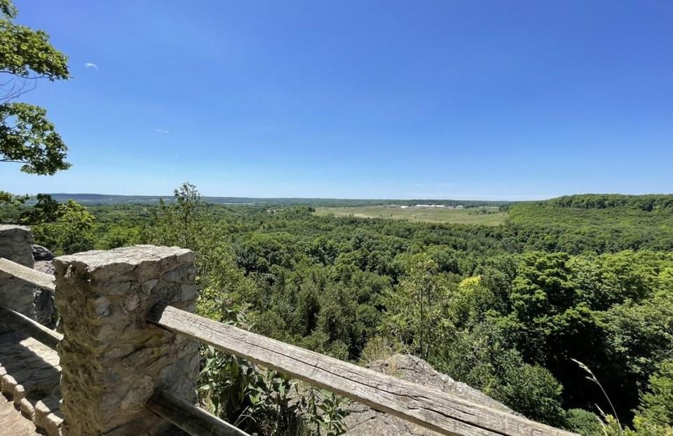 Rattlesnake Point scenic overlook with forest and rolling hills