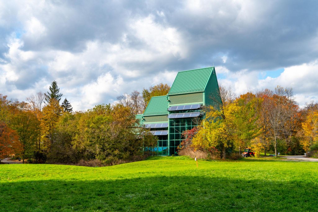 Kortright Centre for Conservation with A-frame roof and autumn foliage