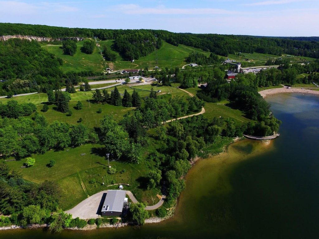 Kelso Conservation Area aerial view with reservoir, beach and rolling hills
