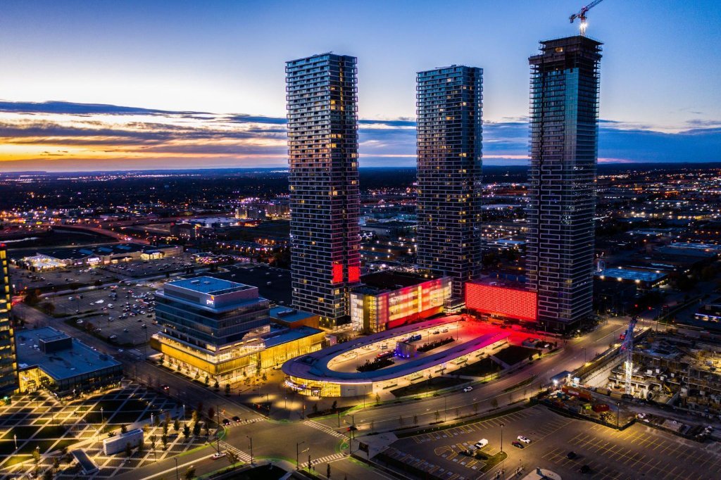 Vaughan Metropolitan Centre skyline at twilight with illuminated towers