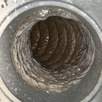 Professional duct cleaning crew at work