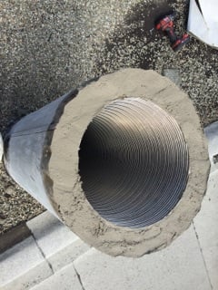 Chimney exterior inspection on rooftop
