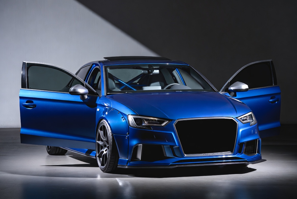 Gull-Wing Blue Sedan