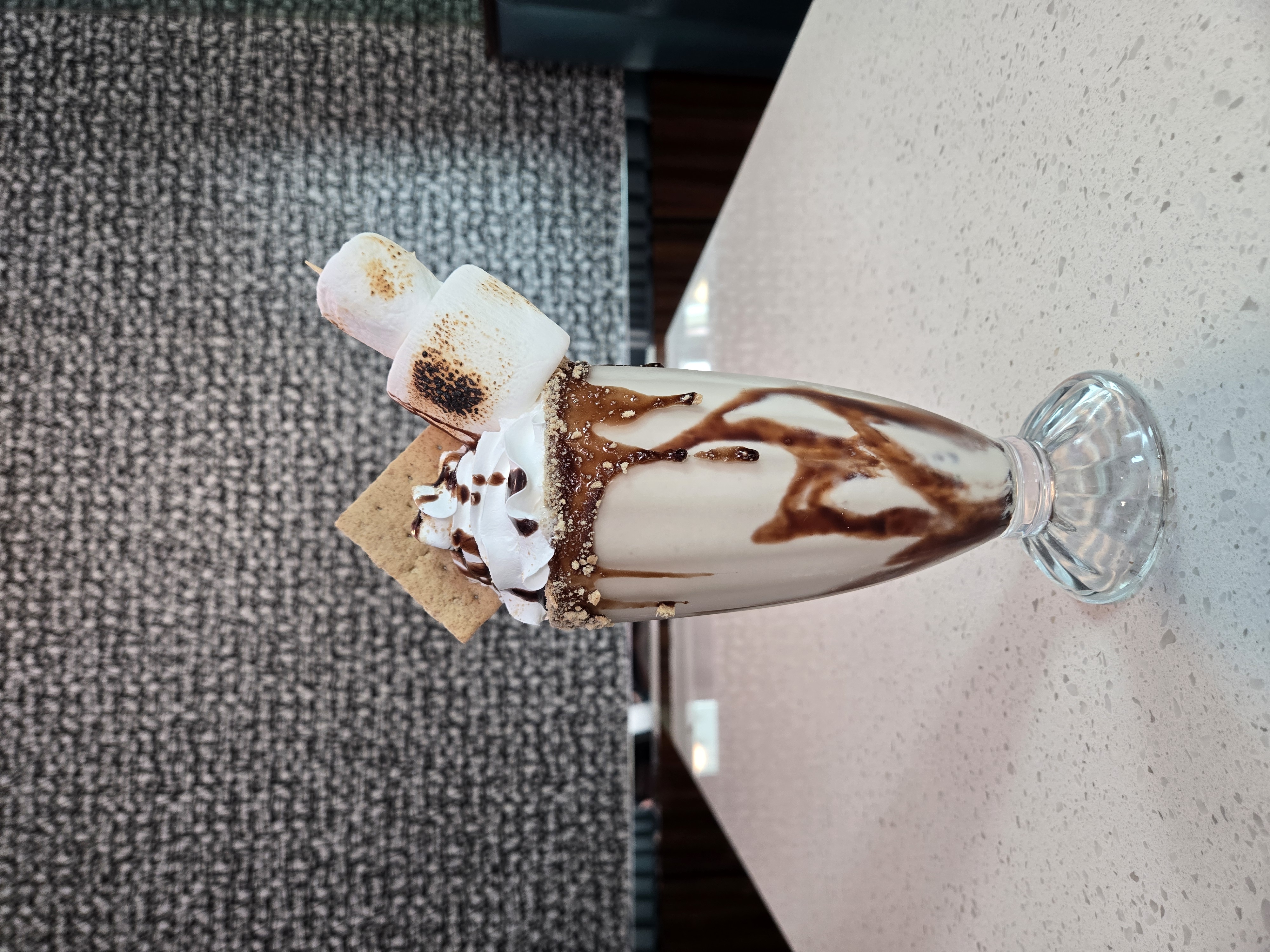 S'mores milkshake with toasted marshmallows and graham cracker