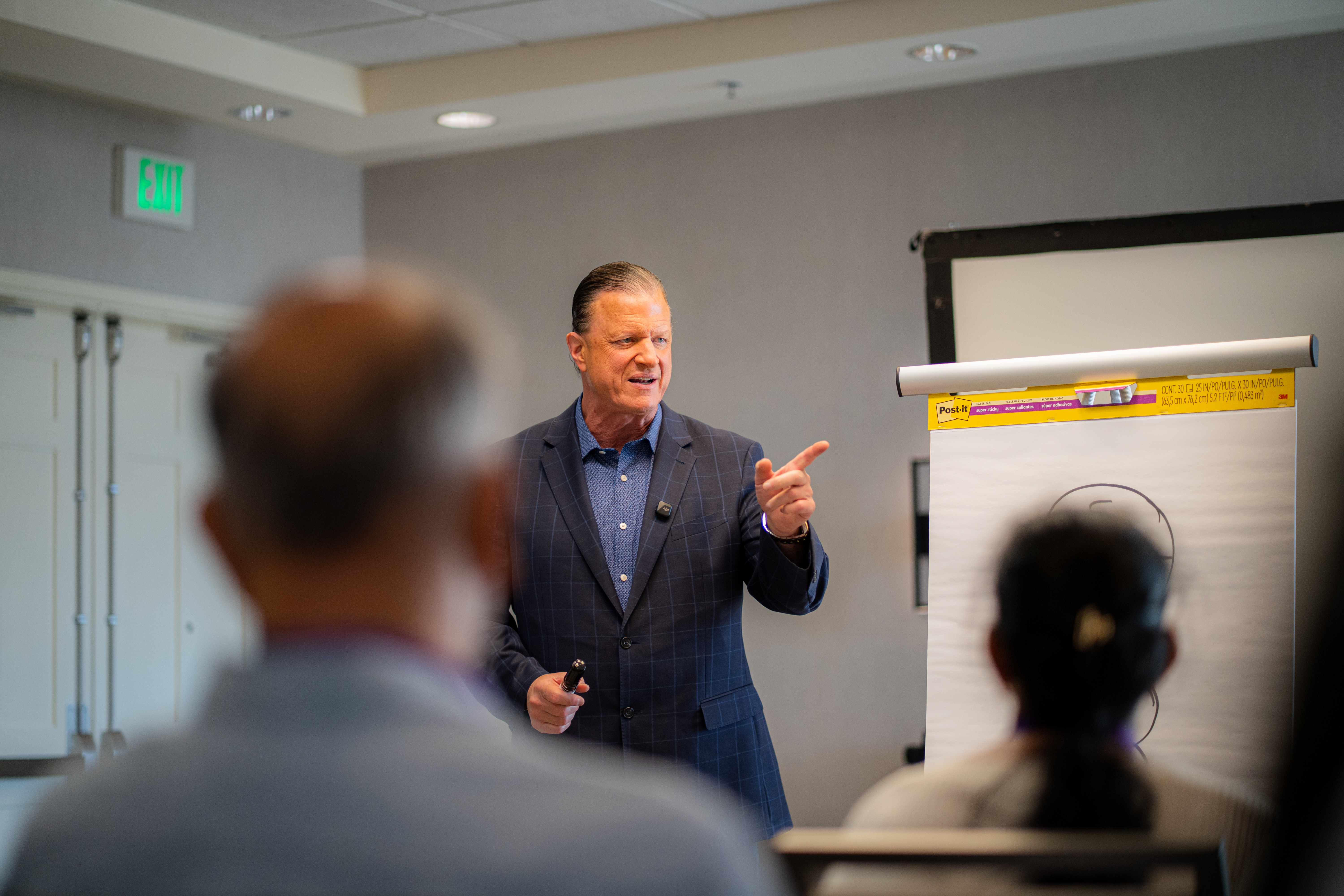 Papi(PJ) DiNuzzo guiding participants during a One-To-Many group coaching session
