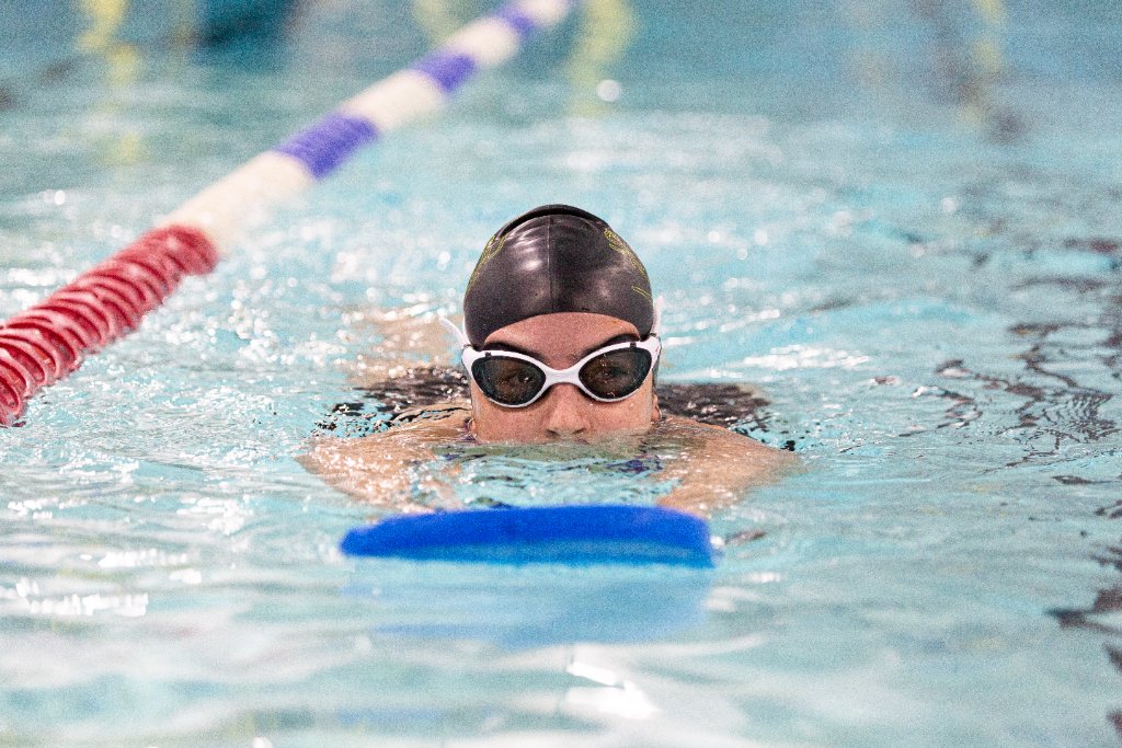 Adult swimmer with kickboard