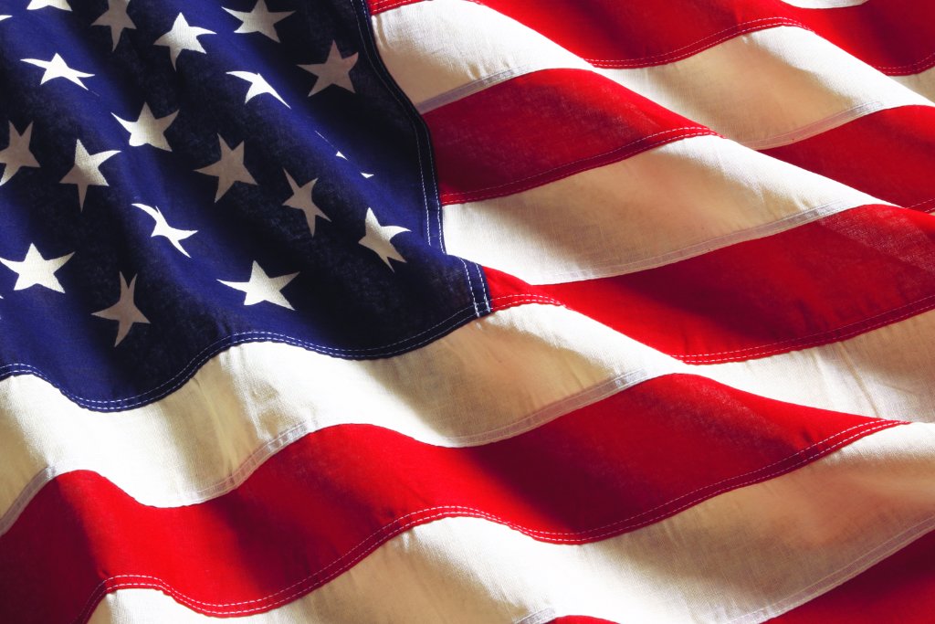 Patriotic red background with a pattern of stars
