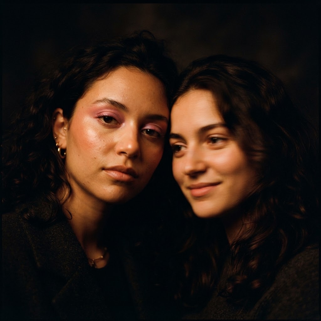Two portraits lit in warm tones