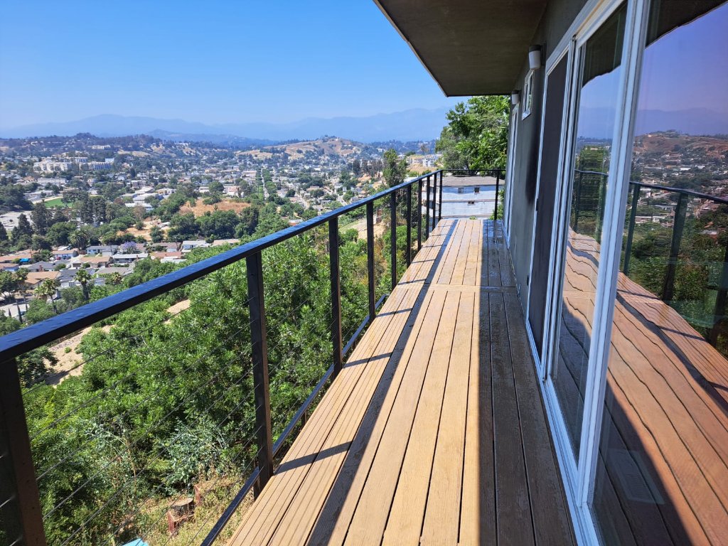 Custom balcony with modern railing for a residential home