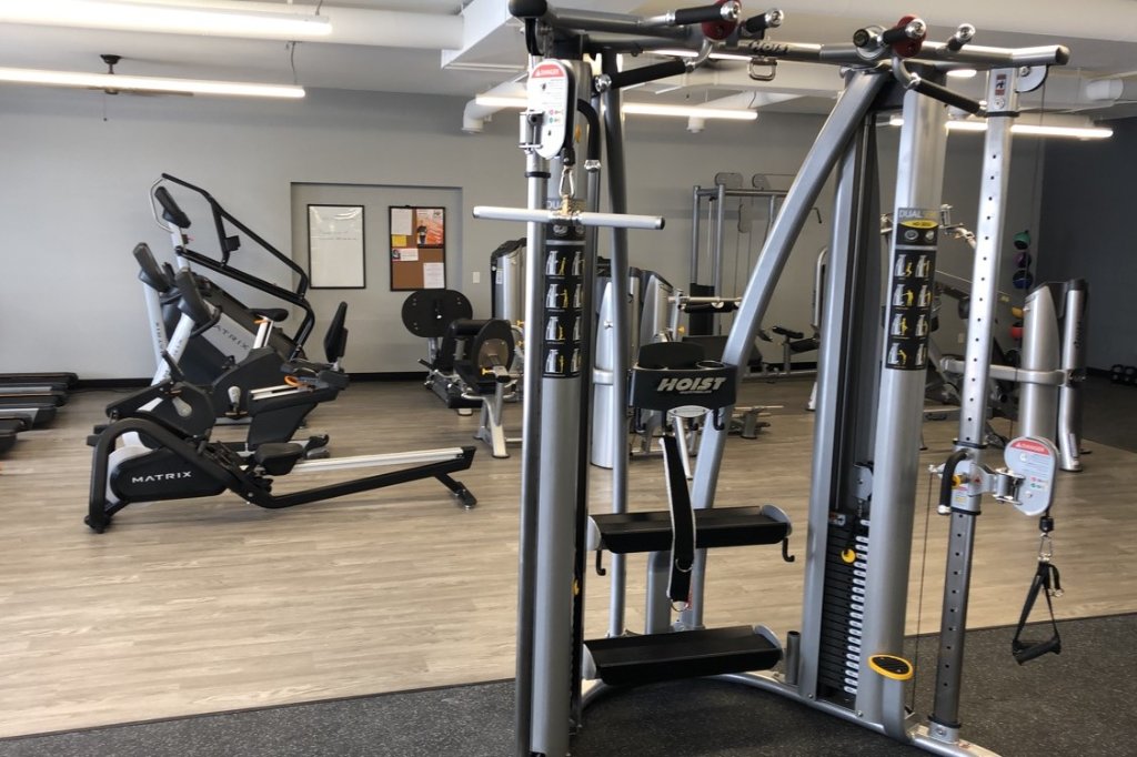 Hoist cable crossover and Matrix rowing machine at Hometown Fitness
