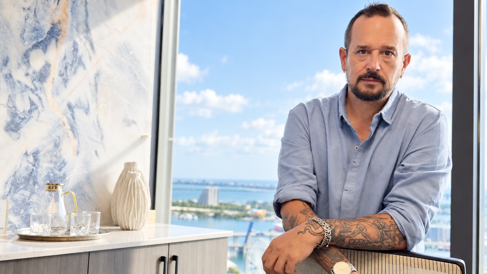 Michael Brady, Founder of SignalTide, photographed in Miami with Biscayne Bay in the background.