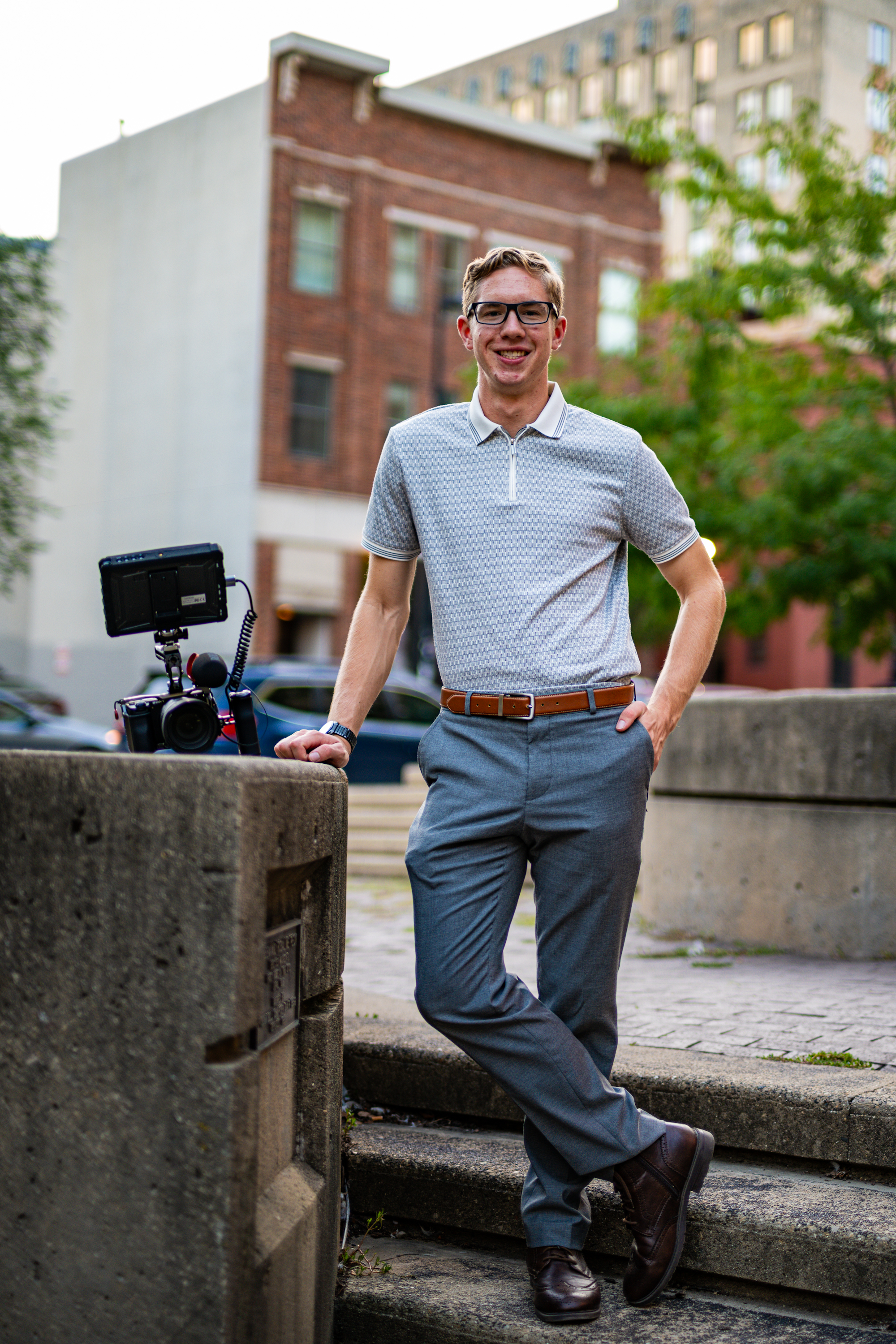 Joe Meinholz beside his camera