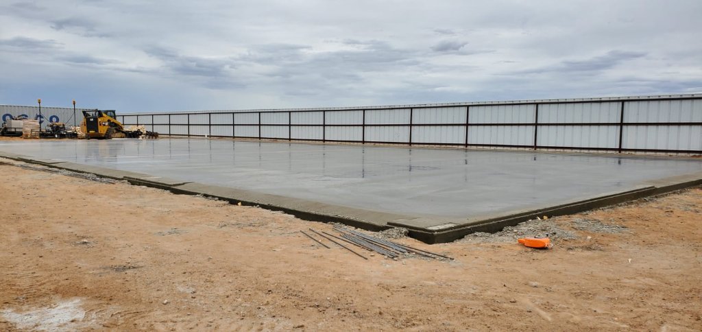 Concrete slab with formwork and rebar on a construction site