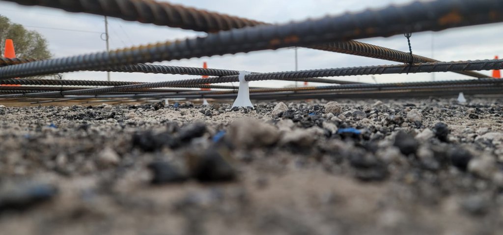 Rebar grid with spacers prepped for a concrete parking lot pour
