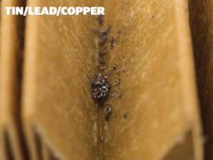 Tin/Lead/Copper debris in filter