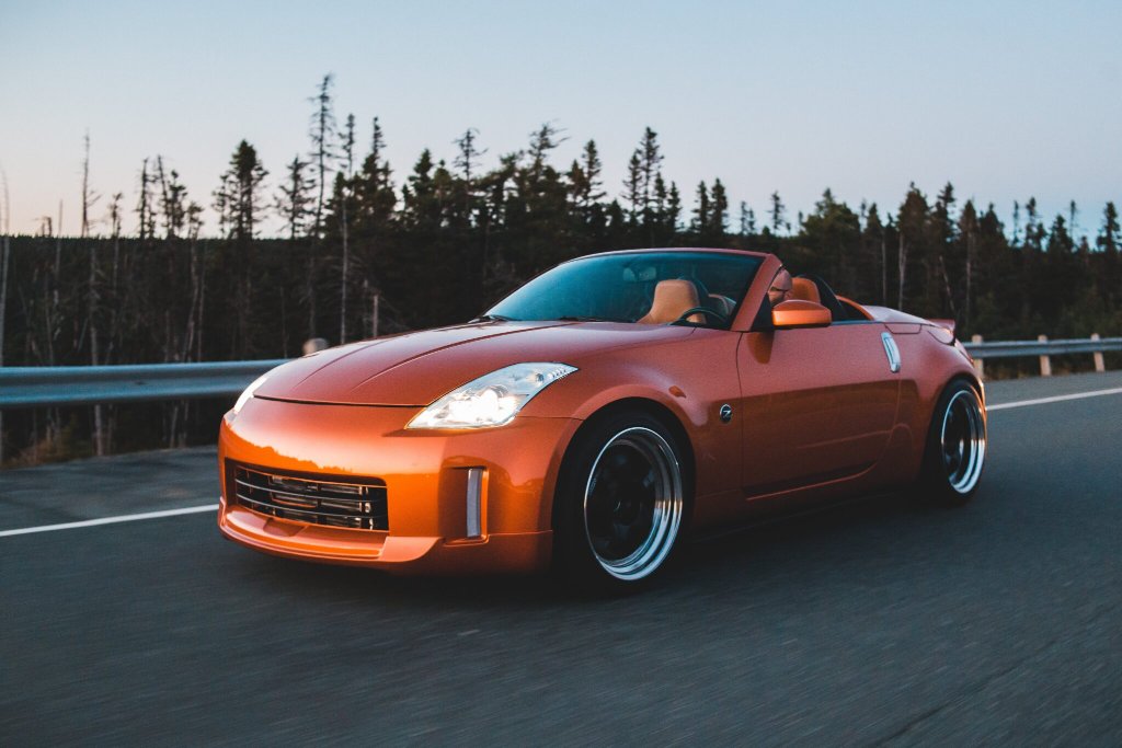 DOT 3 vs DOT 4 Brake Fluid - orange sports car