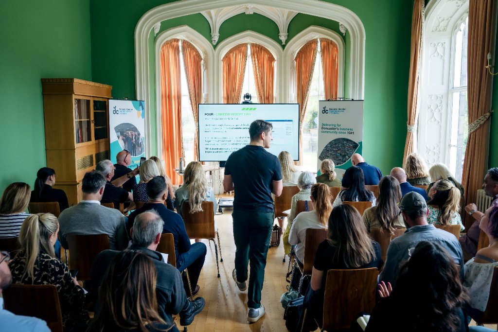 Elliot Ghali from Example Marketing presenting marketing strategy to a large audience of business owners at a Doncaster Chamber event