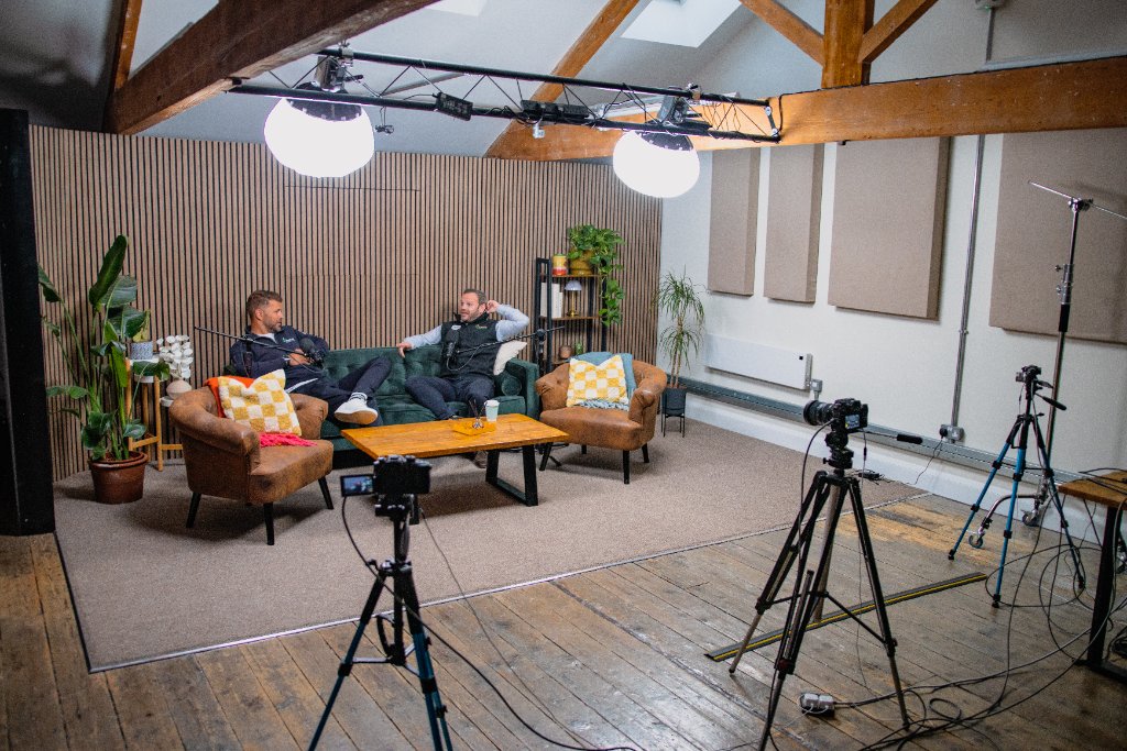 Professional video camera and lighting rig set up during a client content creation day for social media marketing