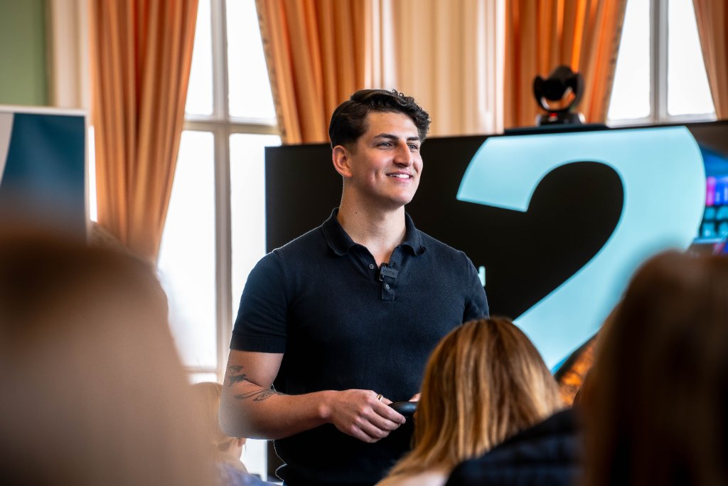 Elliot Ghali hosting the Elevate networking event in Sheffield, speaking to a room of local founders and marketing professionals