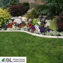 Flowers & decorative rocks, residential landscaping by Michael Durham Landscaping (Durham Region, 2025)