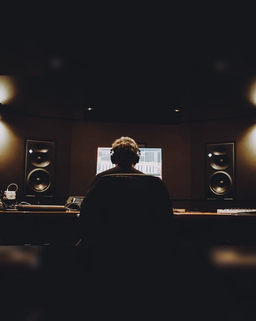 Audio engineer portrait in studio